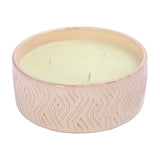 Libra Interiors Embossed Glazed Ceramic Bowl Candle in ivory, a wide round vessel with flowing geometric relief pattern and three wicks set in pale wax.