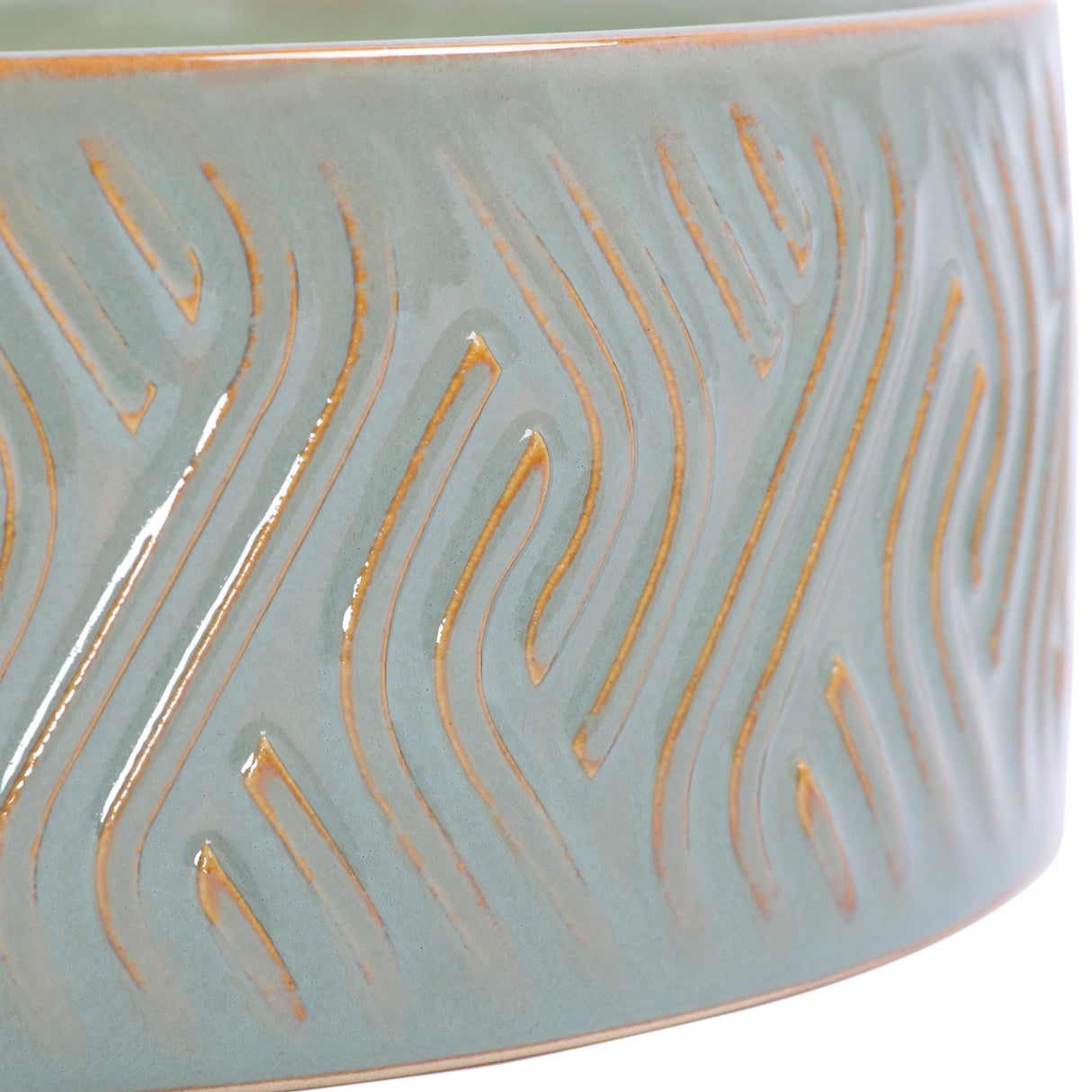 Close-up of the Libra Interiors Embossed Ceramic Bowl Triple-Wick Candle in green, showing the glossy blue-green glaze and amber embossed wave pattern.