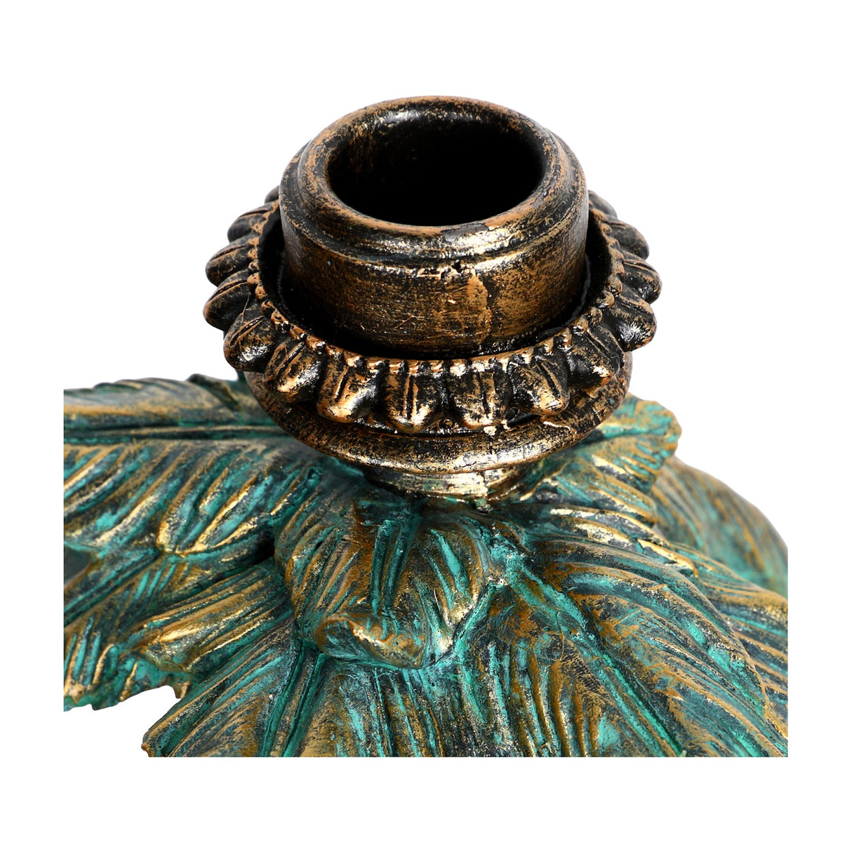 Close-up of the Libra Interiors Palm and Elephant resin candle holder in gold, showing the taper candle fitting atop the palm trunk with green-toned fronds.