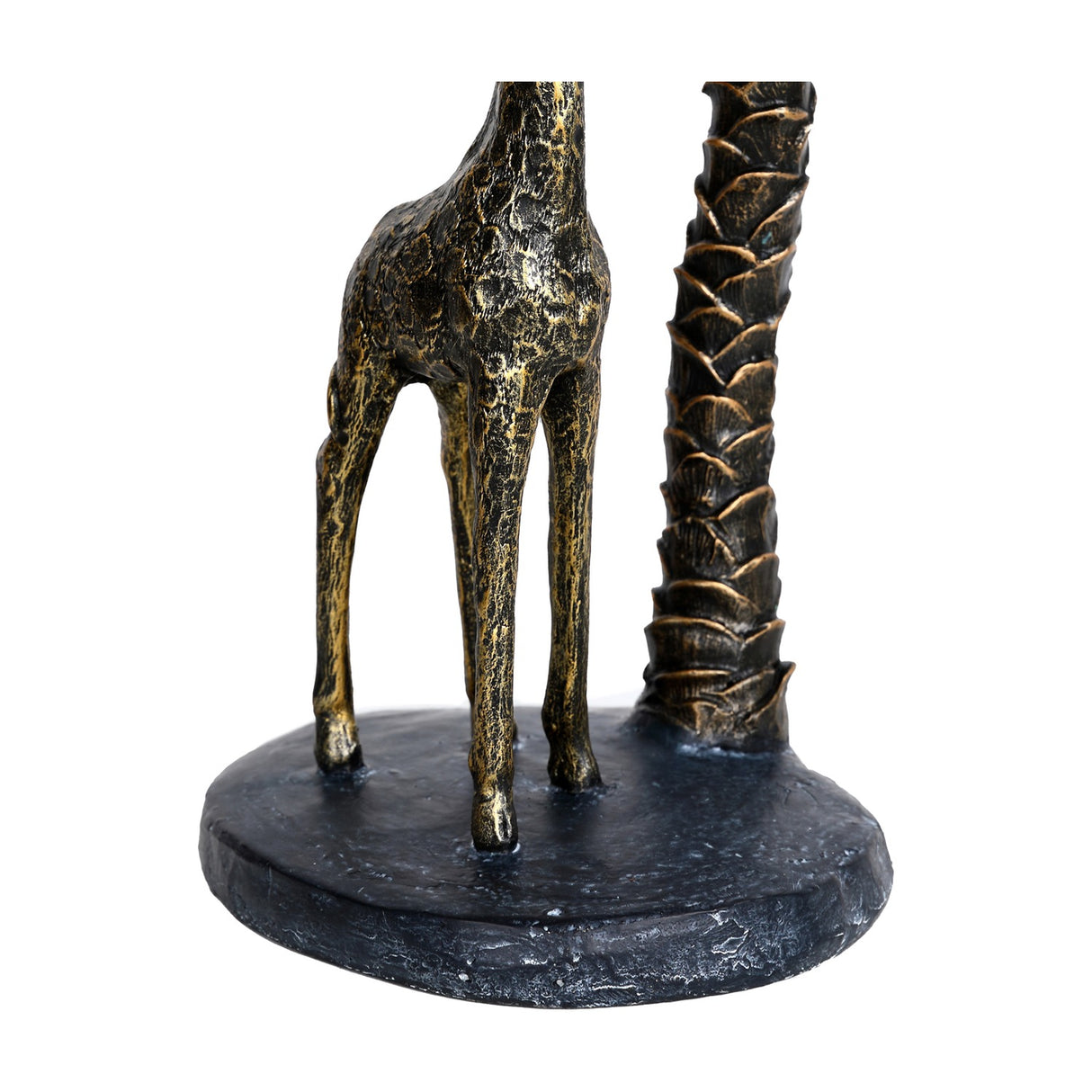 Close-up of the Libra Interiors Giraffe and Palm Resin Candle Holder base, showing slender giraffe legs and textured palm trunk in aged gold.