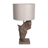 Libra Interiors Sculptural Horse Head Resin Table Lamp in brown with weathered finish and neutral hessian-effect drum shade, on a plain background.