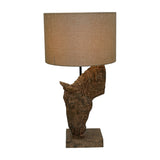 Libra Interiors Sculptural Horse Head resin table lamp in brown with a weathered finish and neutral hessian-effect drum shade, on a white background.