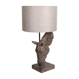 Libra Interiors Sculptural Horse Head Resin Table Lamp in brown with a lowered equine base, square plinth and neutral hessian-effect drum shade.