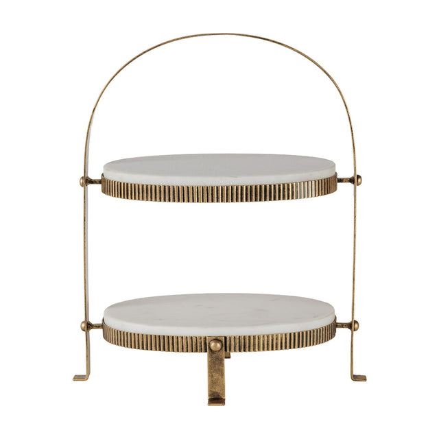 Libra Interiors Marble Two Tier Cake Stand in white with oval Banswara marble platters, corrugated aged gold iron frame and arched handle.