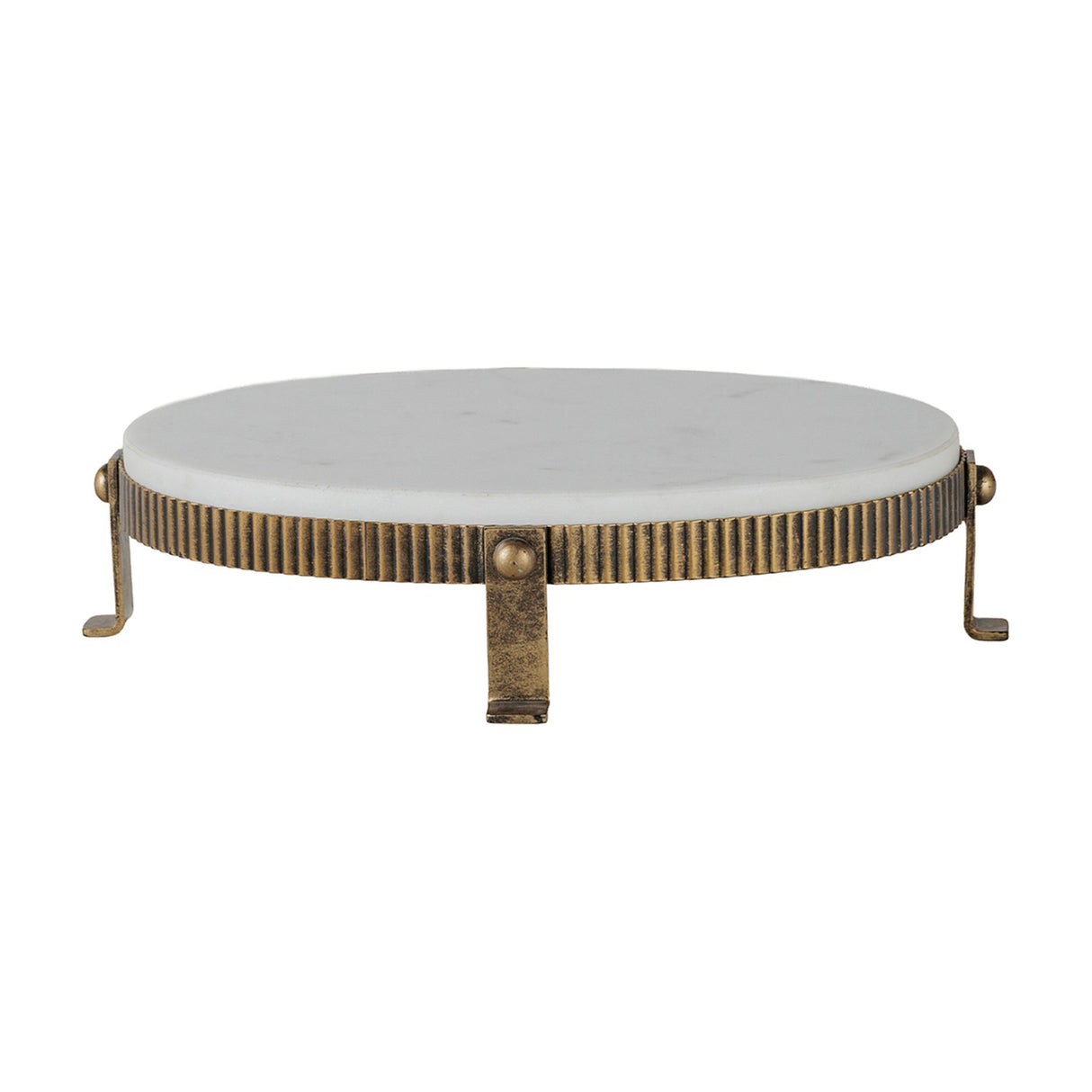 Libra Interiors Marble Oval Aged Gold Cake Stand in white, with a smooth marble top on a corrugated aged gold iron base with splayed feet.