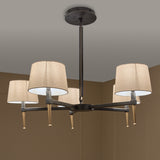 Libra Interiors Bronze Iron 5 Light Linen Chandelier with bronze frame, gilded accents and five linen shades, shown installed against a neutral ceiling.