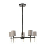 Libra Interiors Bronze Iron 5 Light Linen Chandelier with five pale linen shades on bronze arms with gold tapered tips, shown on a white background.