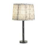 Libra Interiors Bamboo-Effect Pleated Ikat table lamp with grey and cream linen shade on a slim dark bronze ribbed iron base, on a white background.
