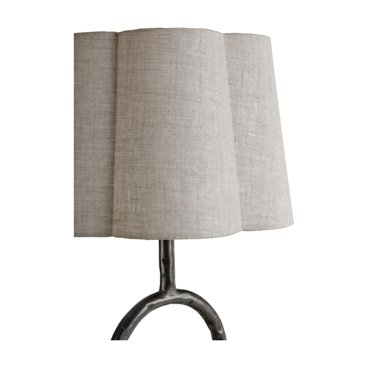 Libra Interiors Hammered Iron Ring Table Lamp in bronze, close-up of the scalloped natural linen shade above a hammered iron stem with open ring detail.