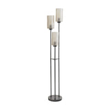 Libra Interiors Frosted Glass 3 Light Floor Lamp in black, with three slim iron pillars and staggered frosted glass flute shades on a round base.