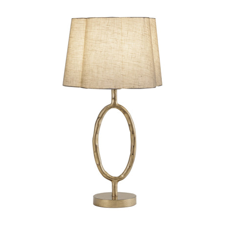 Libra Interiors Hammered Oval Loop table lamp with champagne gold iron base and scalloped ivory woven linen shade, on a plain white background.