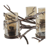 Libra Interiors Branch Design six-light candle lantern with hammered smoked glass holders on a bronze iron frame shaped like branching wood.