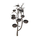 Libra Interiors 11 Light Branch Candelabra in vintage bronze, with eleven round holders spread across an iron twig-form frame on a white background.