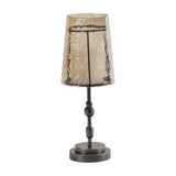 Libra Interiors Hammered Glass Candle Lantern in bronze, with a tapered copper-brown glass shade on a turned iron column and round base.