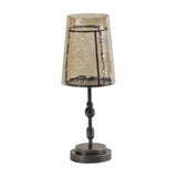 Libra Interiors Hammered Glass Candle Lantern in bronze, with a tapered copper-brown glass shade on a turned iron column and round base.