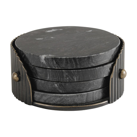 Libra Interiors Marble Round Set of 4 Coasters in black Markino marble with natural veining, stacked in a ribbed dark bronze iron holder with stud detailing.