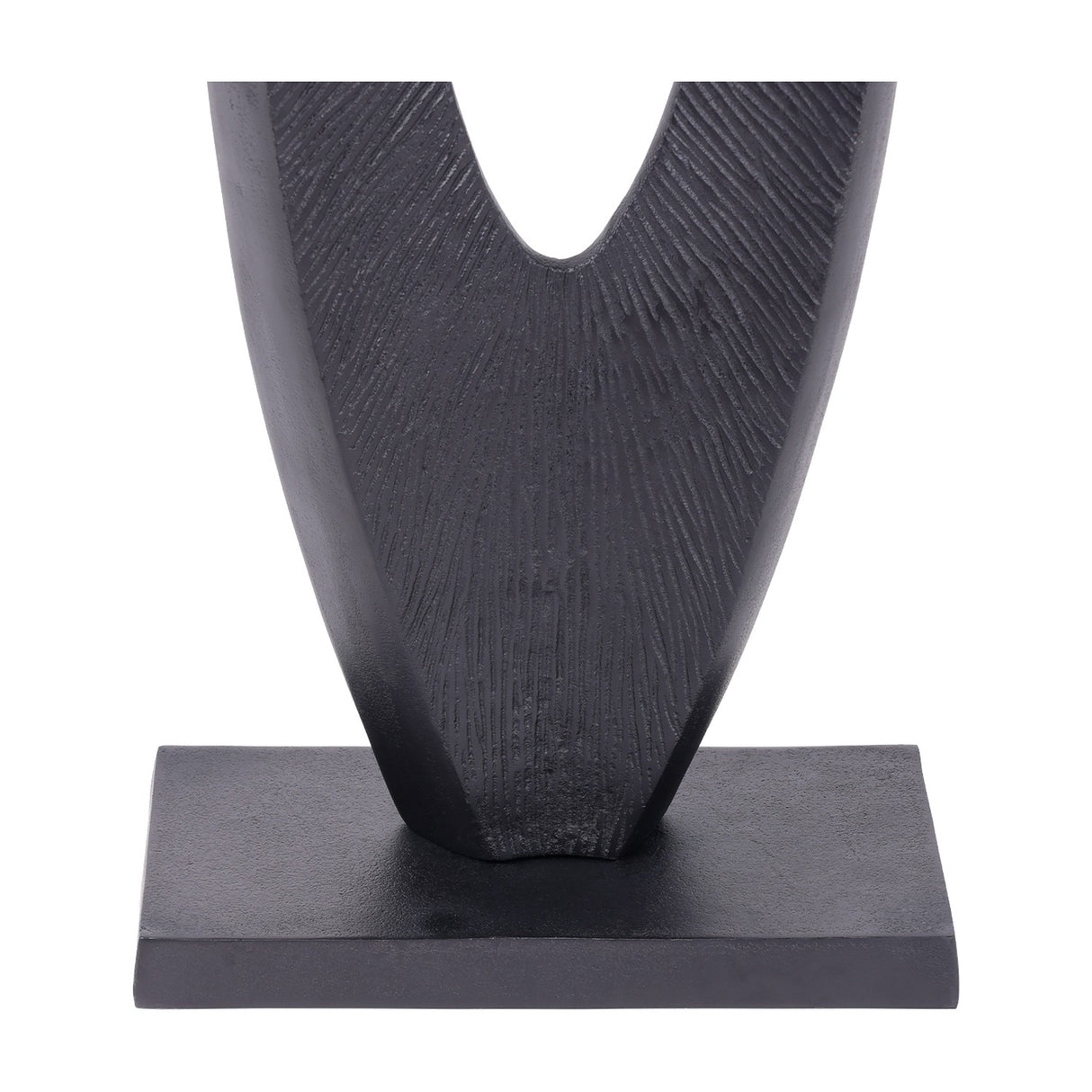 Close-up of the base of the Libra Interiors Textured Abstract Cast Aluminium Sculpture in black, showing the tapered curved form on a flat rectangular plinth.