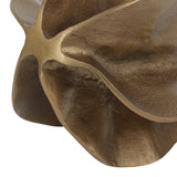 Close-up of Libra Interiors Cast Aluminium Petal Sculpture in antique brass, showing textured folded petals and warm aged metallic finish.