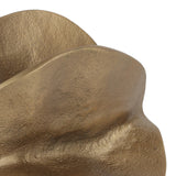 Close-up of Libra Interiors Cast Aluminium Petal Sculpture in antique brass, showing the lightly textured curled petal forms and warm aged finish.