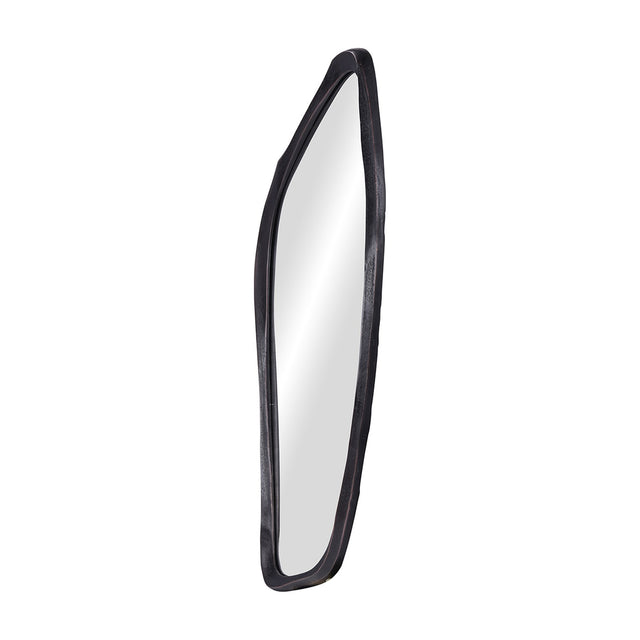Libra Interiors textured cast aluminium organic wall mirror in bronze, shown at a side angle with its tall irregular curved frame on a white background.