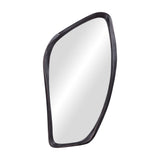 Libra Interiors textured cast aluminium wall mirror with an organic irregular outline and bronze finish, shown at an angle on a plain white background.