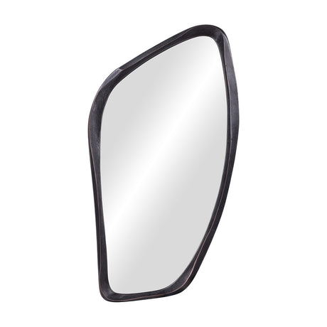Libra Interiors textured cast aluminium wall mirror with an organic irregular outline and bronze finish, shown at an angle on a plain white background.