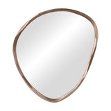 Libra Interiors Textured Organic Cast Aluminium Wall Mirror in antique brass, shown at an angle with its asymmetric pebble-shaped frame on a white background.