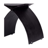 Close-up of the Libra Interiors Cast Aluminium Curved Stool in black, showing the arched leg and textured charred finish against a white background.