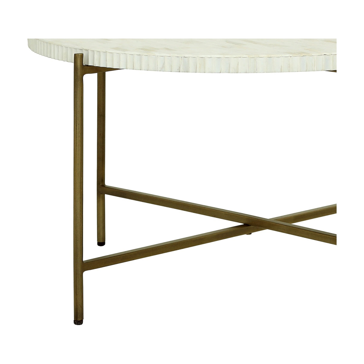 Close-up of Libra Interiors Bone Inlay Round Brass Coffee Table showing the fluted white bone edge and tapered antique brass legs with crossed stretcher.