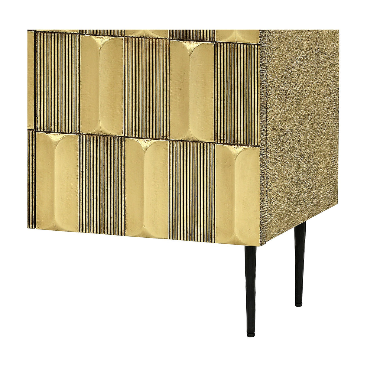 Libra Interiors Sculpted Brass Large Sideboard corner detail showing antique brass tiled relief front, shagreen-effect side and slender black iron leg.