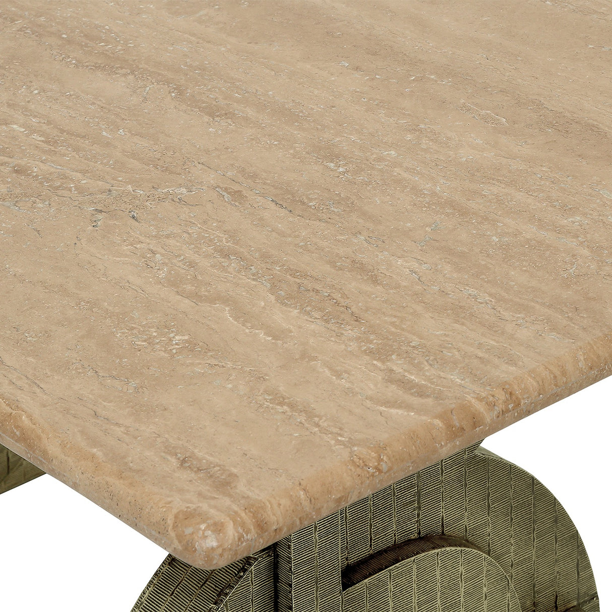 Close-up of the Libra Interiors Travertine Twin-Pedestal Dining Table showing the cream stone top's veining and an etched antique brass pedestal below.