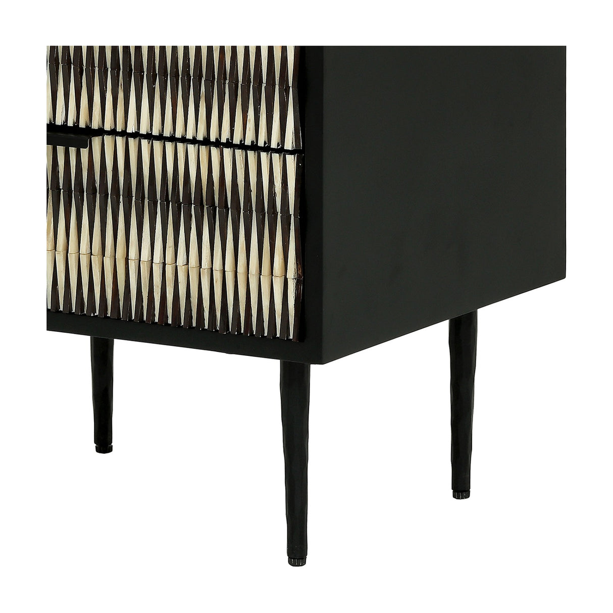 Close-up of the Libra Interiors Bone Inlay 2-Drawer Bedside Table in black, showing the ivory geometric drawer fronts and tapered iron legs.