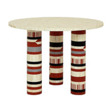 Libra Interiors Bone Inlay Round Dining Table with cream bone top and three cylindrical legs in terracotta, black, ivory and grey geometric inlay.