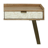 Close-up of Libra Interiors Scalloped Bone Inlay Mango Wood Desk showing the cream scalloped drawer front, mango wood frame and antique brass tapered leg.