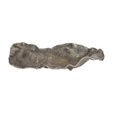 Libra Interiors woven-effect cast aluminium decorative bowl in antique brass, with an elongated organic form, undulating wavy edges and small feet.