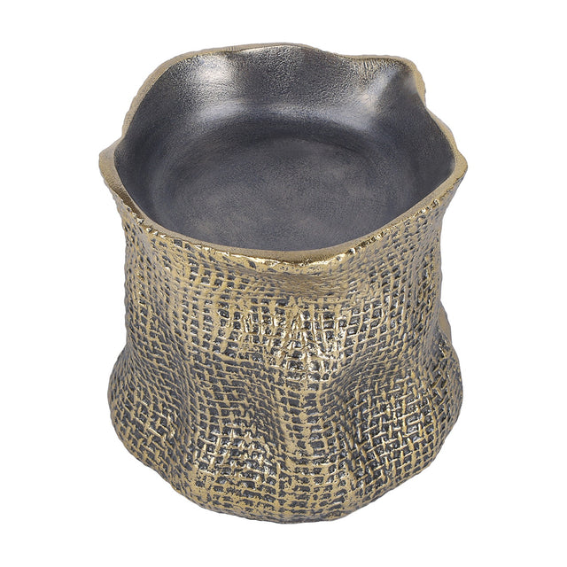 Libra Interiors woven-effect cast aluminium candle holder in antique brass with an organic irregular rim and smooth matt grey inner well, on a white background.
