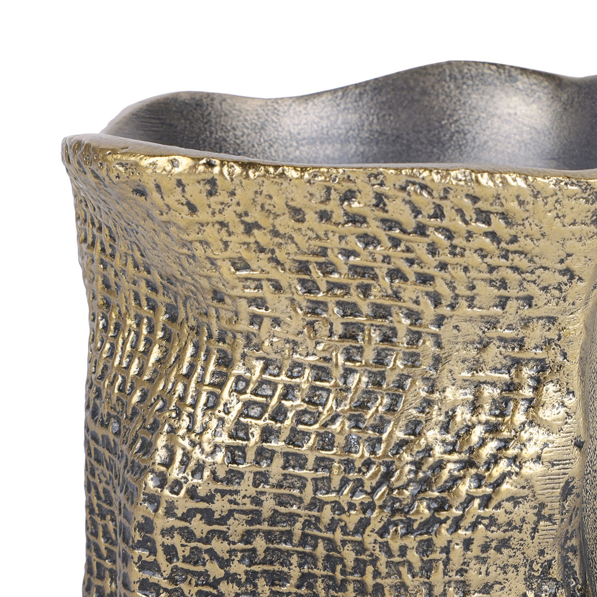 Close-up of Libra Interiors Woven-Effect Cast Aluminium Candle Holder in antique brass, showing the textured fabric-like exterior and irregular rim.