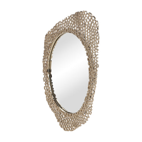 Libra Interiors Honeycomb cast aluminium wall mirror in gold, with an organic rounded frame featuring openwork honeycomb texture, shown at an angle.