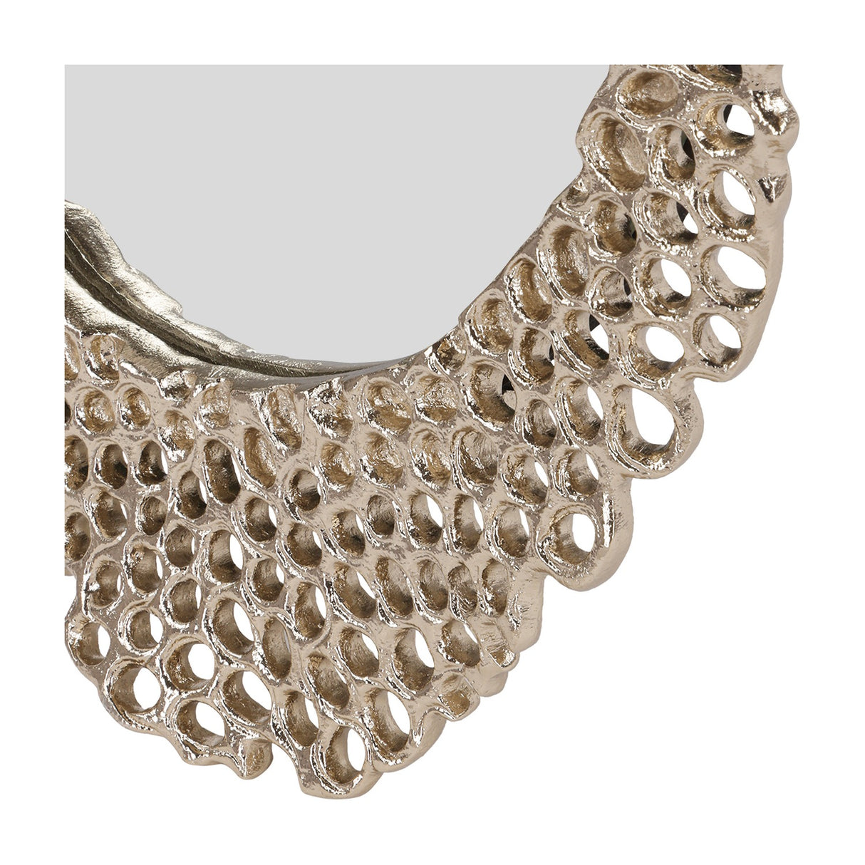 Close-up of the Libra Interiors Honeycomb cast aluminium wall mirror in gold, showing the openwork honeycomb frame texture against a white background.