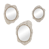 Libra Interiors Honeycomb cast aluminium wall mirrors in gold, shown as a trio of irregular oval frames with openwork lace-like texture on a white background.