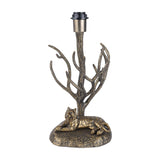 Libra Interiors Antiqued Brass Tiger Table Lamp base with a resting tiger beneath bare branching limbs holding an E27 fitting, shown on a white background.