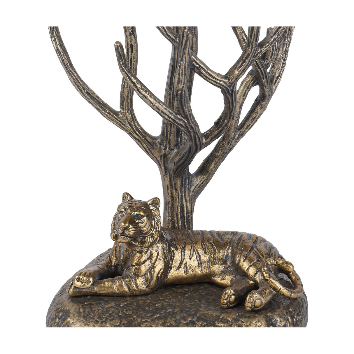 Libra Interiors Antiqued Brass Tiger Table Lamp base detail showing a resting tiger beneath bare branching limbs with etched stripes and bark texture.