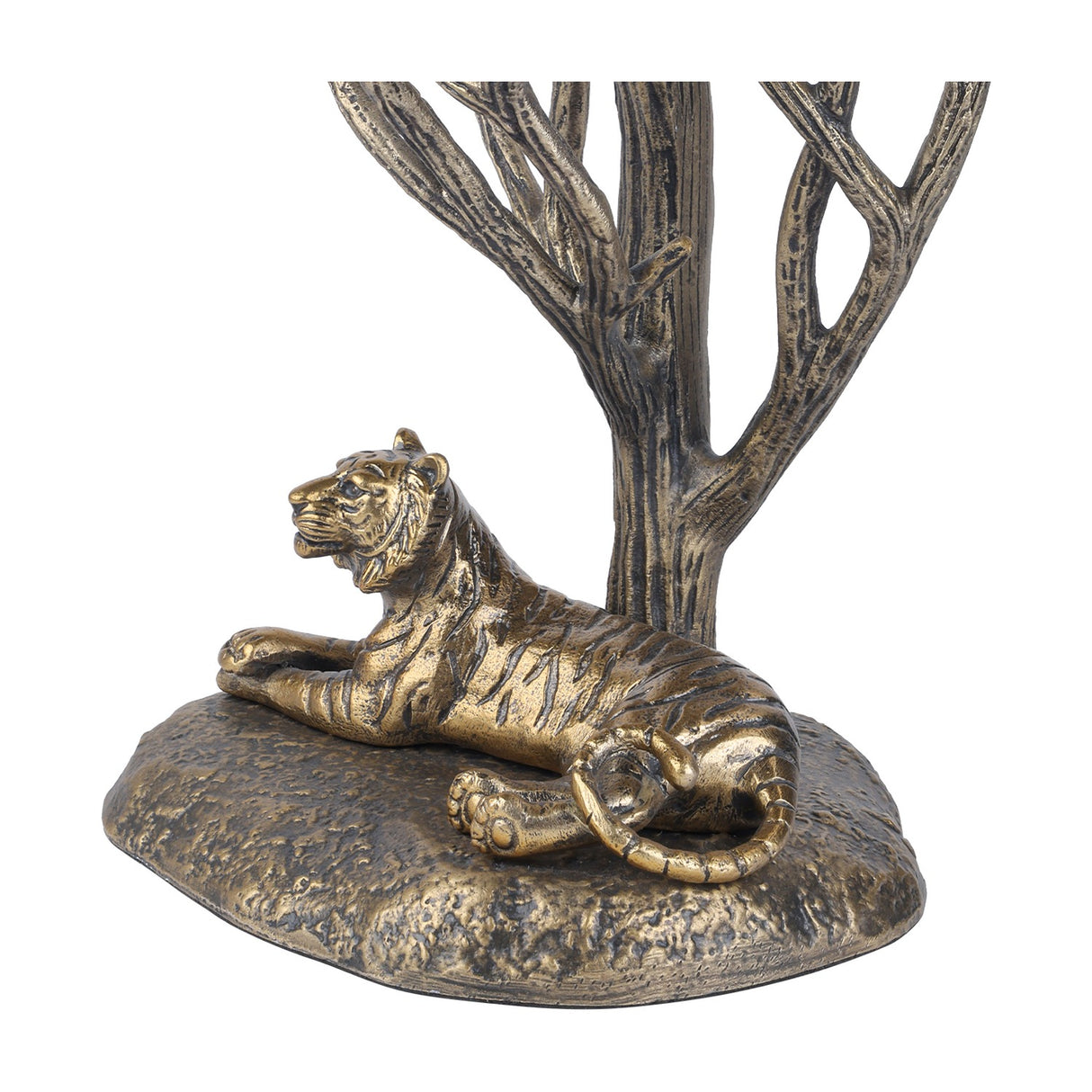 Libra Interiors Antiqued Brass Tiger Table Lamp base detail showing a resting tiger sculpture beneath bare branching limbs with etched stripes and bark texture.