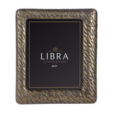 Libra Interiors etched cast aluminium 8x10" photo frame in antique brass with tiger-stripe texture, shown upright in portrait orientation on a white background.