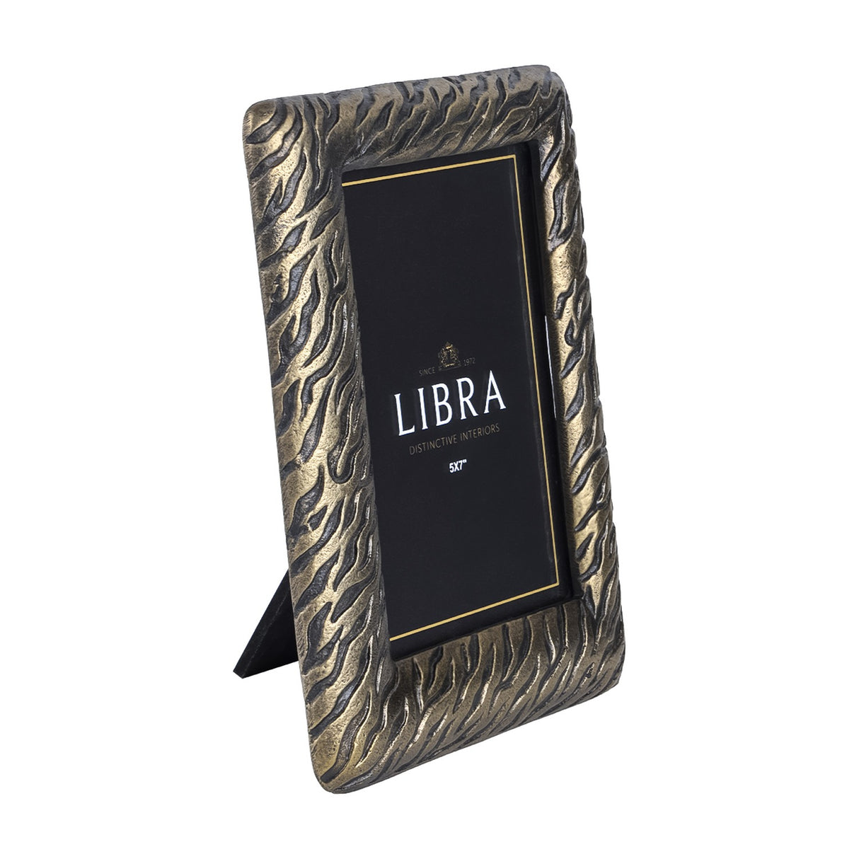 Libra Interiors Etched Tiger cast aluminium 5x7" photo frame in antique brass with textured tiger-stripe border and rear stand for portrait display.