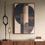 Libra Interiors Textured Geometric Framed Canvas Wall Art in black, brown and cream tones, hung above a fluted wood console with sculptural figures.