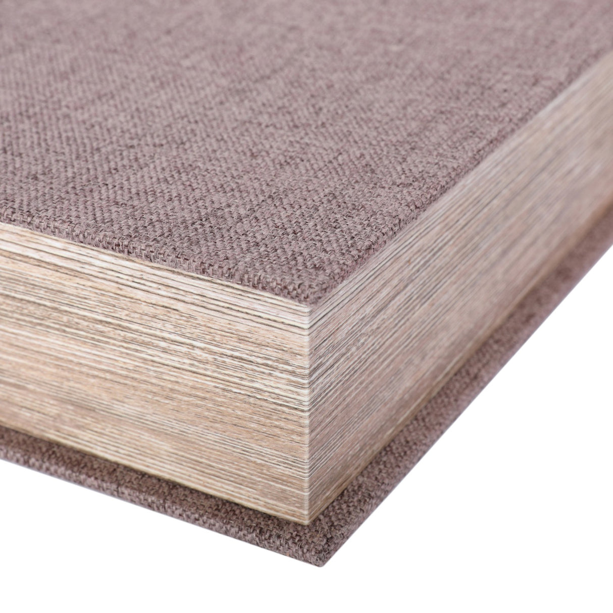 Close-up corner detail of Libra Interiors Linen Weave Book-Style Storage Box in grey, showing textured linen wrap and layered wood edges mimicking book pages.