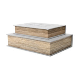 Libra Interiors Linen Book-Style Storage Boxes in white and pale grey with wood-textured page sides, stacked as a set of two on a plain background.