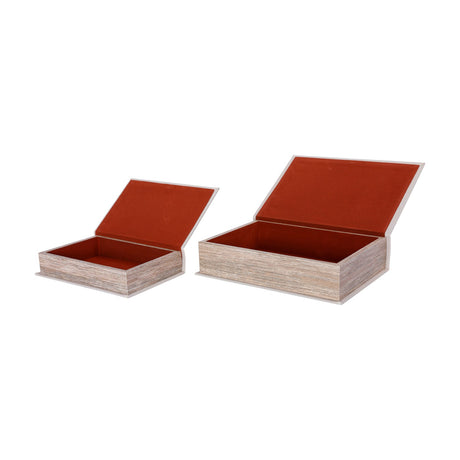 Libra Interiors Linen Book-Style Storage Boxes in white with textured page-edge sides and orange velvet-lined interiors, shown open on a plain background.