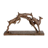 Libra Interiors Rustic Leaping Fawns resin sculpture in weathered brown, showing three stylised deer mid-leap on a rectangular base against a white background.